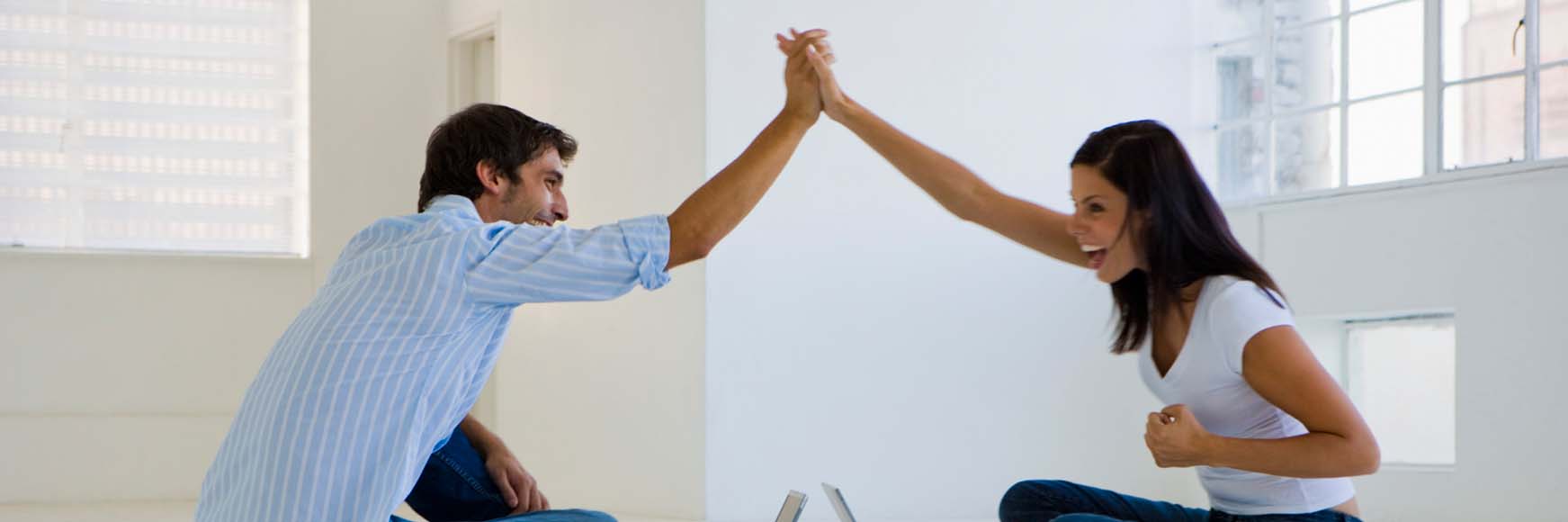 a couple high-fiving