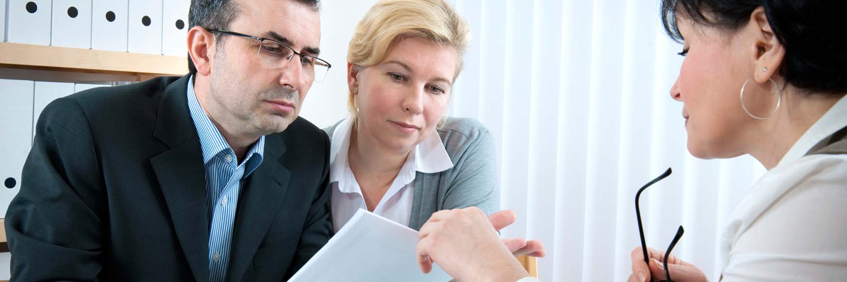 a couple meeting with an agent